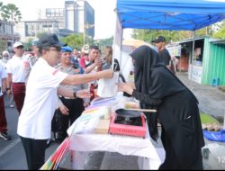 Sambut Hari Bhayangkara ke-79, Kapolda NTB Sapa dan Berbagi Kebahagiaan dengan Warga di CFD Udayana